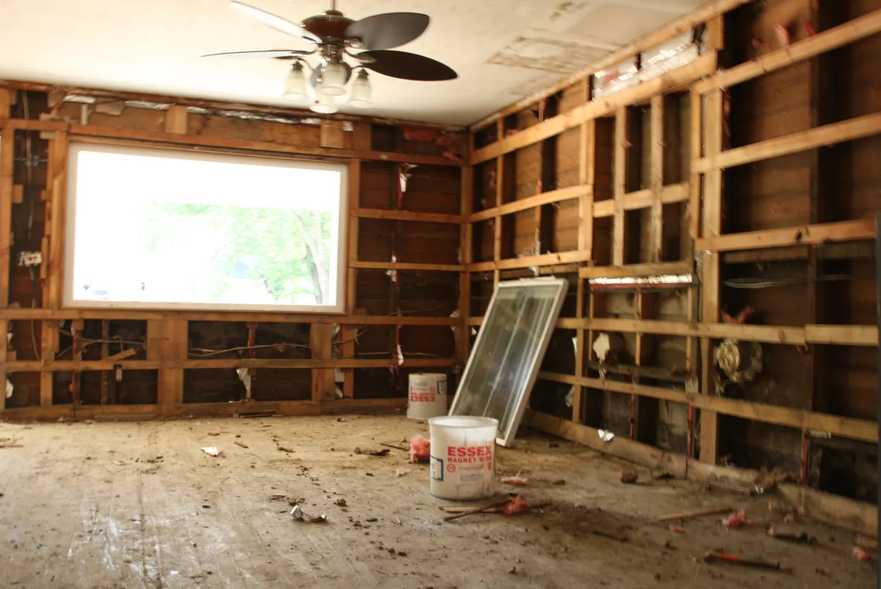 Representative flood-affected interior with exposed framing, photographed outside South Carolina